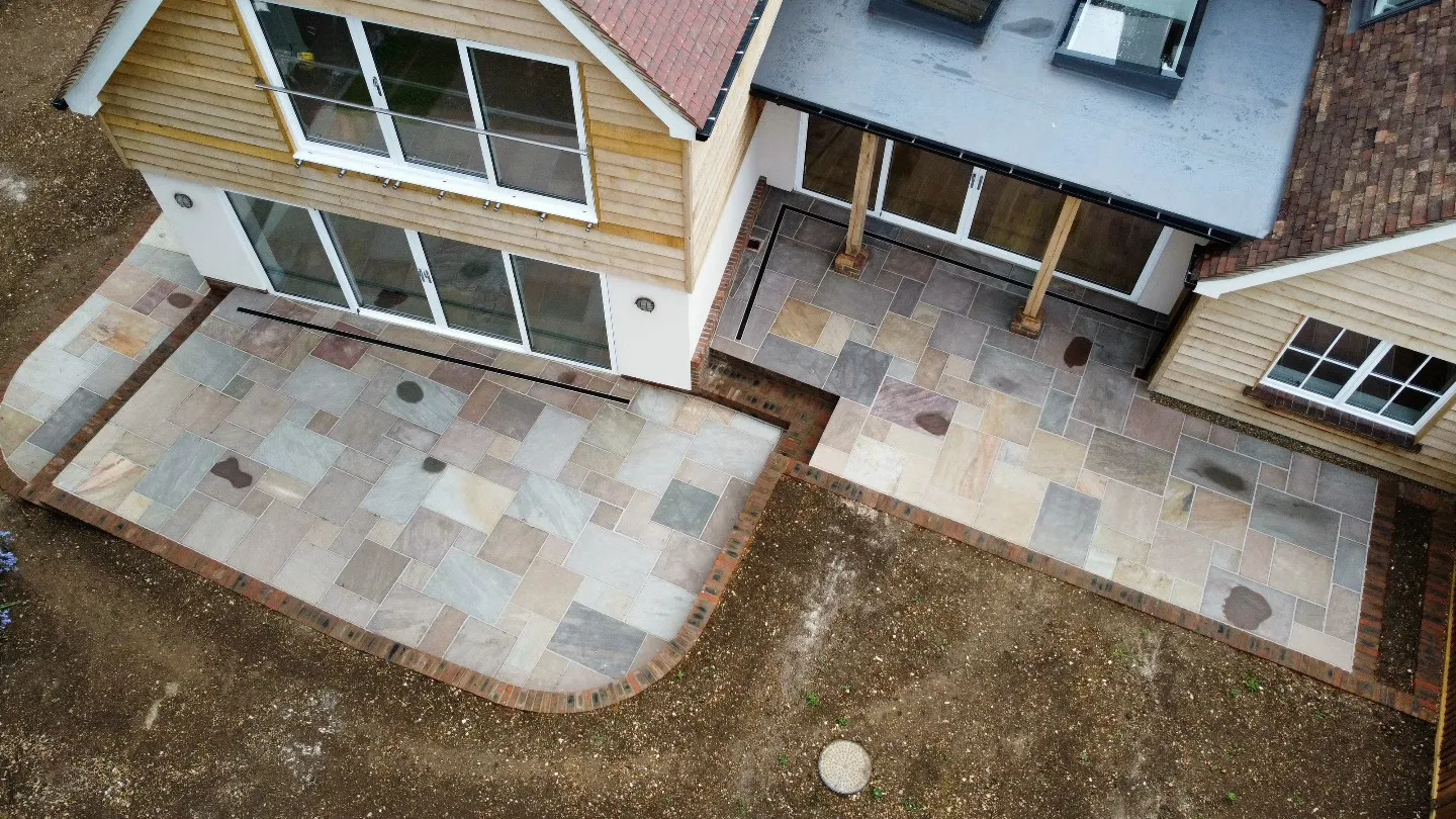 An aerial view of a two story house.