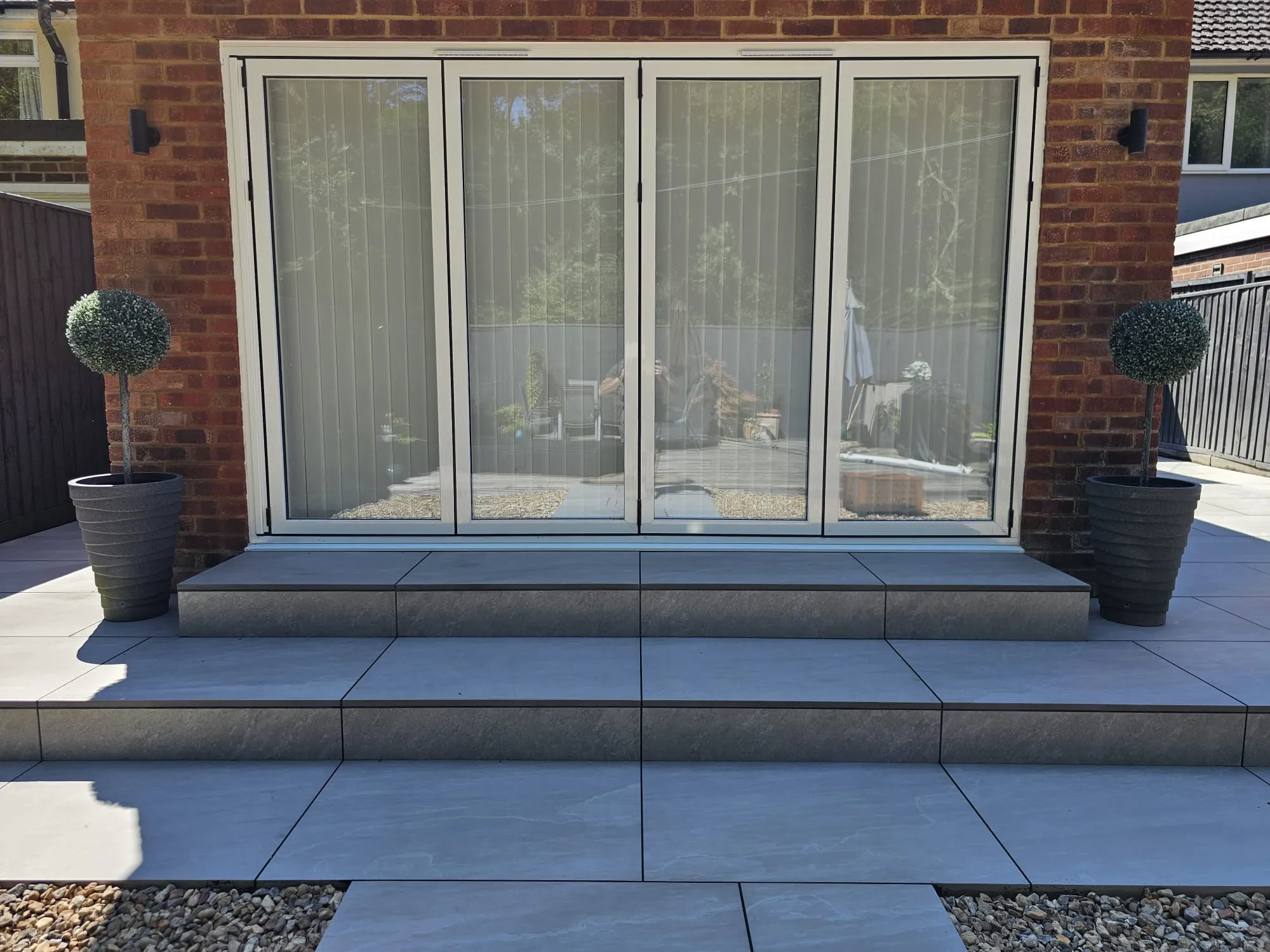 a brick building with a glass front door